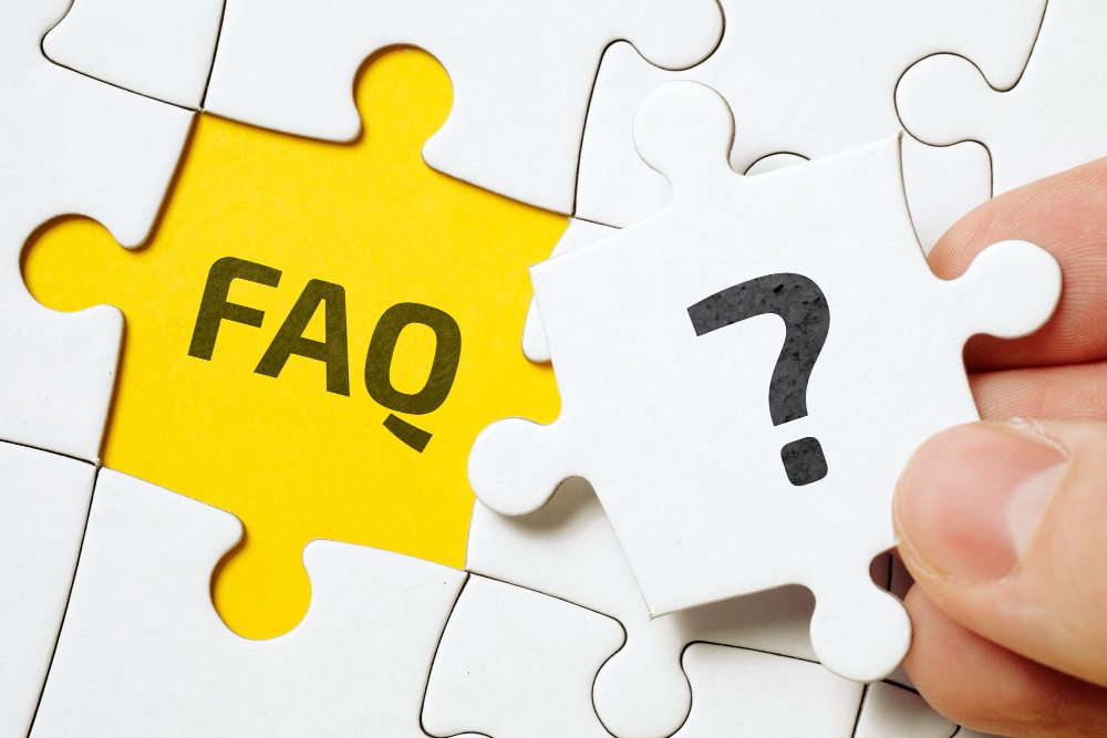 FAQ puzzle pieces with a question mark